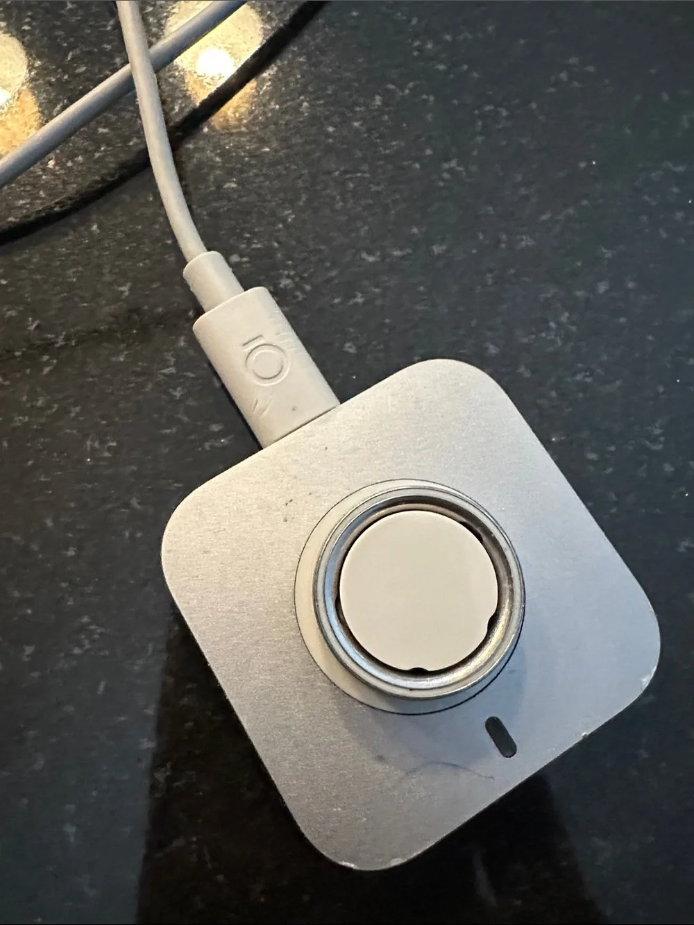 Oura Silver Charging Dock with silver ring